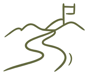 A winding path leading over a hill to a flag